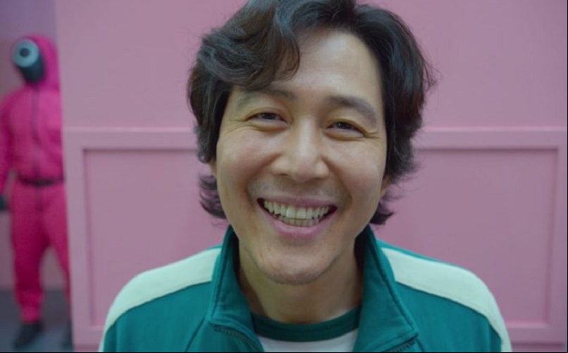 Lee Jung-jae é um aclamado ator sul-coreano, famoso por seus papéis em filmes e dramas, incluindo Round Six (2021), como Seong Gi-Hun. Sua performance intensa e versatilidade lhe renderam diversos prêmios, consolidando sua posição como um dos melhores atores da indústria cinematográfica sul-coreana.