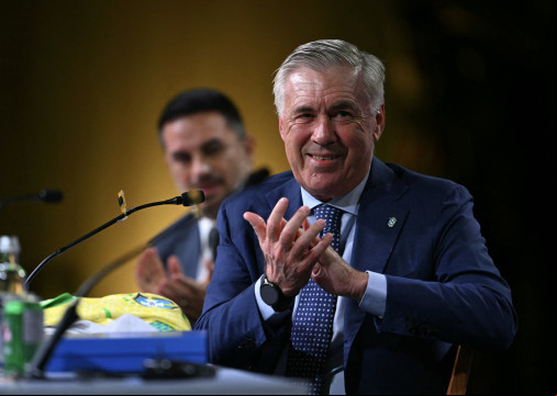 Brazil's football team new head coach, Italian Carlo Ancelotti, applauds during his official presentation at a hotel in Barra da Tijuca neighbourhood, Rio de Janeiro, Brazil, on May 26, 2025. (Photo by Mauro PIMENTEL / AFP)